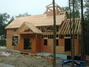 Custom-built home with exterior walls in progress