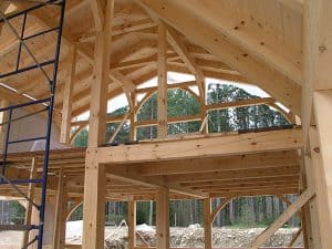 Exposed timber frame of a Smith Building Company custom-built home